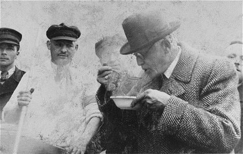 Chaim Rumkowski tasting soup in the Łódź Ghetto